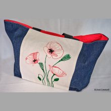 Shopping bag with poppy pattern on white background